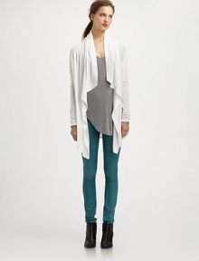 From the HELMUT capsule collection. Whisper-weight jersey cardigan with a draped front pairs perfectly with your favorite colored skinnies. Open draped frontLong sleevesRuched cuffsAbout 34 from shoulder to hem80% modal/20% nylonDry cleanMade in CanadaModel shown is 5'9 (176cm) wearing US size Small.