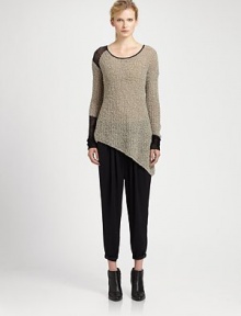 From the HELMUT capsule collection. Semi-sheer contrast trim and an asymmetrical hem modernize this plush bouclé sweater. RoundneckSingle semi-sheer shoulderLong sleevesSemi-sheer cuffsAsymmetrical hemAcrylic/wool/polyesterDry cleanImportedModel shown is 5'11 (178cm) wearing US size Small.