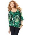 Put the punch back into your wardrobe with INC's printed peasant top. The vivid colors add pop to any outfit!