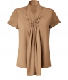 Raise the bar on contemporary classics with Steffen Schrauts elegant beige short sleeve silk top -  Small stand up collar with decorative draped silk panel at front - Easy, feminine silhouette tapers gently through waist - Pair with a blazer or denim jacket and style with with pencil skirts, skinny denim or dress trousers