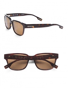 A full-rim design featuring a rich tortoiseshell pattern and a temple logo detail.AcetateBrown polarized lens100% UV protectiveImported A full-rim design featuring a rich tortoiseshell pattern and a temple logo detail.AcetateBrown polarized lens100% UV protectiveImported
