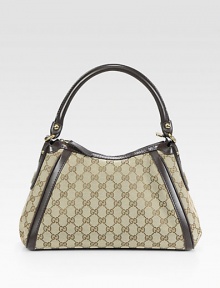 Signature jacquard logo, in a structured top handle silhouette trimmed with rich leather and studded interlocking G detail.Top handle, 6¾ dropTop zip closureOne inside zip pocketTwo inside open pocketsLinen lining13W X 8½H X 3DMade in Italy Signature jacquard logo, in a structured top handle silhouette trimmed with rich leather and studded interlocking G detail.Top handle, 6¾ dropTop zip closureOne inside zip pocketTwo inside open pocketsLinen lining13W X 8½H X 3DMade in Italy