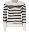 With classic coloring and a chunky knit mercerized cotton, Theorys striped pullover is a contemporary way to wear springs nautical trend - Round neckline, long sleeves, ribbed trim, soft material sheen - Slim fit - Wear with a pleated skirt and flats, or with slim fit shorts and sandals