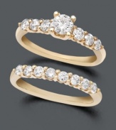 Dazzle her with a dual set of diamonds. Diamond engagement ring and wedding band feature sparkling round-cut diamonds (1-1/4 ct. t.w.) set in 14k gold.