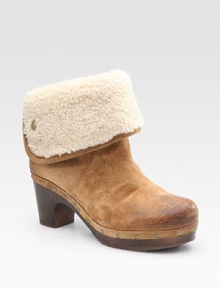 Soft slightly distressed suede clog updated by edgy studs and a plush shearling cuff. Wooden heel, 2½ (65mm) Covered platform, ¾ (20mm) Compares to a 1¾ heel (45mm) Suede upper Genuine shearling cuff Rubber sole Padded insole Imported