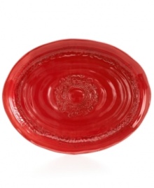 Homegrown style. An organic shape and engraved florals give the Espana Antica platter a handcrafted feel that suits country settings. With a glossy red finish. From the Tabletops Unlimited dinnerware collection. Homegrown style. An organic shape and engraved florals give the Espana Antica platter a handcrafted feel that suits country settings. With a glossy red finish. From the Tabletops Unlimited dinnerware collection.