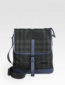 A slender crossbody bag is refined in an iconic-check pattern with leather trim.Flap, buckle closureAdjustable shoulder strapInterior pocket95% polyamide/5% acrylic12W x 14HMade in Italy A slender crossbody bag is refined in an iconic-check pattern with leather trim.Flap, buckle closureAdjustable shoulder strapInterior pocket95% polyamide/5% acrylic12W x 14HMade in Italy