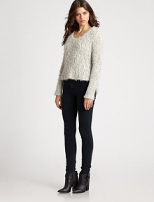 Lush angora, closely cropped and crafted in a fuzzy open knit.ScoopneckLong sleevesPullover styleAsymmetrical hem40% angora/40% wool/20% polyamideDry cleanImported