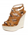 Stand tall in the Sibey wedges by Joan and David. They're ultra strappy with a tall, yet walkable wedge.