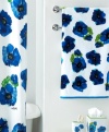 Your bath, in bloom. Taking inspiration from American artist Vera Neumann's classic silk scarves, the Poppies fingertip towel features a bold, modern poppy design in refreshing shades of blue. Finished with blue piping along the edges.