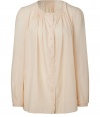 Elegant top in fine, nude cotton and linen blend - On-trend, ample tunic cut - Round collar with gather detail and long sleeves - Crochet trim at button placket - A chic, feminine basic as versatile as it is stylish - Works for both day and evening - Pair with shorts and sandals, or go for a dressier look with skinny jeans and platform wedges