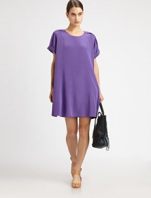 Exquisite silk t-shirt dress with body-skimming pleats and a relaxed silhouette. RoundneckPleated shouldersShort sleevesPleated cuffsBack button closuresAbout 18 from natural waistSilkDry cleanImportedModel shown is 5'10 (177cm) wearing US size 4. Exquisite silk t-shirt dress with body-skimming pleats and a relaxed silhouette. RoundneckPleated shouldersShort sleevesPleated cuffsBack button closuresAbout 18 from natural waistSilkDry cleanImportedModel shown is 5'10 (177cm) wearing US size 4.