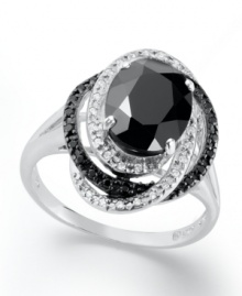 Mysterious brilliance. A stunning oval-cut onyx (8mm x 10mm) makes a captivating focal point in this formal ring amidst swirled bands of white diamonds (1/10 ct. t.w.) and black diamonds (1/10 ct. t.w.). Ring set in sterling silver. Size 7. Mysterious brilliance. A stunning oval-cut onyx (8mm x 10mm) makes a captivating focal point in this formal ring amidst swirled bands of white diamonds (1/10 ct. t.w.) and black diamonds (1/10 ct. t.w.). Ring set in sterling silver. Size 7.