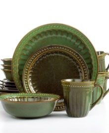 Go green. Add a touch of tradition to your table with this distinctive dinnerware set from Gibson. Fluted details meld with a mottled hue, imbuing any occasion with old-world charm. Go green. Add a touch of tradition to your table with this distinctive dinnerware set from Gibson. Fluted details meld with a mottled hue, imbuing any occasion with old-world charm.