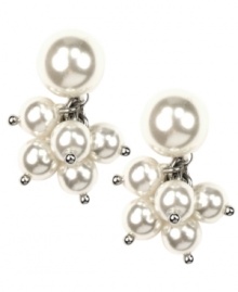 Chic clusters! Classic pearl earrings are an elegant essential for any jewelry collection, but AK Anne Klein updates them with a decorative drop silhouette. Set in silver tone mixed metal with glass pearls. Approximate drop: 3/4 inch.