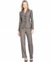 A unique fabric with a touch of shine enhances this elegant petite pantsuit from Le Suit. Add a satin blouse or a colorful shell to complete the look.