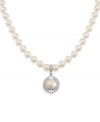 Classic cool. Carolee's necklace is crafted from silver-tone mixed metal with glass pearls figuring prominently, particularly on the pendant adorned with glistening glass stones. Approximate length: 17 inches. Approximate drop: 1/4 inch.