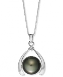 Good luck and a touch of polish. This sophisticated horseshoe-shaped pendant features a cultured Tahitian pearl (11-13 mm) and a sparkling diamond accent. Set in sterling silver. Approximate length: 18 inches. Approximate drop: 1 inch. Good luck and a touch of polish. This sophisticated horseshoe-shaped pendant features a cultured Tahitian pearl (11-13 mm) and a sparkling diamond accent. Set in sterling silver. Approximate length: 18 inches. Approximate drop: 1 inch.