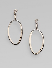 From the Kali Collection. A free-formed, open oval drop with a pebbled interior in sleek sterling silver. Sterling silverLength, about ¾Post backImported 