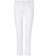 Get the of-the-moment look in these stylish cropped pants from Michael Kors - Button tab front detail, slim fit, ankle-grazing length, front leg crease, two front slash pockets, two back welt button pockets - Pair with a V-neck pullover, bold-shoulder blazer, and wedge booties
