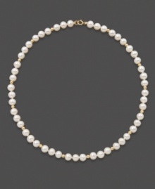 For the little girl who wants to look just like mom. This simple strand of cultured freshwater pearls (5-6 mm) makes a perfect gift. Set in 14k gold with gold accent beads. Approximate length: 14 inches. For the little girl who wants to look just like mom. This simple strand of cultured freshwater pearls (5-6 mm) makes a perfect gift. Set in 14k gold with gold accent beads. Approximate length: 14 inches.