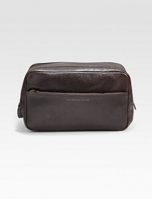 A traveling essential, crafted from rich textured leather.One side handleDouble zip and magnetic closureExterior, interior pocketsRemovable interior bagLeather10W x 6¼H x 4¾DImported A traveling essential, crafted from rich textured leather.One side handleDouble zip and magnetic closureExterior, interior pocketsRemovable interior bagLeather10W x 6¼H x 4¾DImported
