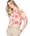 Go floral in this cheerful button-front shirt from Jones New York Signature. Pair it with everything from white denim to chinos for sophisticated style.