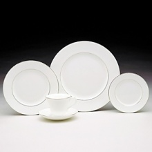 Subtle elegance rimmed in gleaming platinum; mix and match with colorful chargers for a dramatic statement. Bone China. Made in England.Place setting includes dinner plate, salad plate, bread & butter and cup & saucer. Subtle elegance rimmed in gleaming platinum; mix and match with colorful chargers for a dramatic statement. Bone China. Made in England.Place setting includes dinner plate, salad plate, bread & butter and cup & saucer.