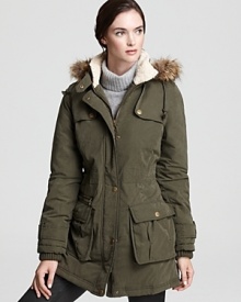 This luxe take on the anorak comes to you from DKNY. Perfect for days and nights, weekdays and weekends, you can now greet the inclement weather in utilitarian-chic style. This luxe take on the anorak comes to you from DKNY. Perfect for days and nights, weekdays and weekends, you can now greet the inclement weather in utilitarian-chic style.