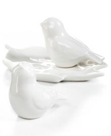 Sweet but sleek. Bird salt and pepper shakers are natural companions to the modern table setting, perched on a leaf-shaped tray in glazed white porcelain from Martha Stewart Collection. Sweet but sleek. Bird salt and pepper shakers are natural companions to the modern table setting, perched on a leaf-shaped tray in glazed white porcelain from Martha Stewart Collection.
