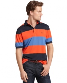 It only seems like you work hard at looking good with this lightweight, striped performance polo shirt from Izod.