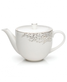 Fringed with shimmering leaves of platinum and mica, this bone china teapot turns your table into a springtime utopia. Its sleek shape and smooth lid are a vision of modern elegance in platinum-banded white. Fringed with shimmering leaves of platinum and mica, this bone china teapot turns your table into a springtime utopia. Its sleek shape and smooth lid are a vision of modern elegance in platinum-banded white.