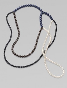 From the Night Blue Collection. This versatile piece features multi-colored strands of pearlized glass beads in an artfully asymmetrical style. Length, about 56½ Slip-on style Imported From the Night Blue Collection. This versatile piece features multi-colored strands of pearlized glass beads in an artfully asymmetrical style. Length, about 56½ Slip-on style Imported