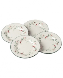 A classic holly print with embossed accents and a scalloped edge make Pfaltzgraff Winterberry salad plates a festive addition to holiday tables. A classic holly print with embossed accents and a scalloped edge make Pfaltzgraff Winterberry salad plates a festive addition to holiday tables.