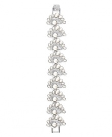 Remarkably refined. Embrace the elegance of this flex bracelet from Monet. Embellished with sparkling Swarovski crystals, as well as glass accents and simulated pearls, it's set in silver tone mixed metal. Approximate length: 7-1/2 inches.