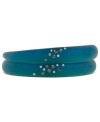 Relaxing, deep blue sea hues. Kenneth Cole New York's set of 2 resin bracelets are adorned with pave crystals. Crafted in silver tone mixed metal with blue-green resin. Approximate diameter: 2-1/2 inches. Approximate width: 3/8 inch.