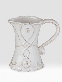 Bring the outdoors inside with a smaller, hand-finished stoneware pitcher beautifully detailed with a scrolling design that celebrates the splendor and romance of the world's most beautiful gardens. Chip resistant 5 high Dishwasher safe Imported