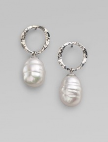 Distinctive white baroque pearls dangle delightfully from hammered sterling silver hoops. 12mm white baroque organic man-made pearls Sterling silver Hoop diameter, about ½ Post back Made in Spain Distinctive white baroque pearls dangle delightfully from hammered sterling silver hoops. 12mm white baroque organic man-made pearls Sterling silver Hoop diameter, about ½ Post back Made in Spain