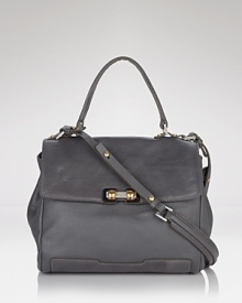 Explore ladylike territory with MARC BY MARC JACOBS top handle satchel. Roomy yet refined, this leather bag gives fall's loud prints and vibrant hues an urbane hit. Explore ladylike territory with MARC BY MARC JACOBS top handle satchel. Roomy yet refined, this leather bag gives fall's loud prints and vibrant hues an urbane hit.