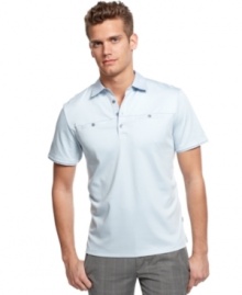 Change up your polo style with this double chest pocket shirt from Calvin Klein.