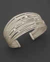 Brilliant diamonds and lustrous pearls accent bands of sterling silver in India Hicks' Tread cuff.