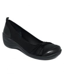 The Karrington wedge pumps by Easy Spirit feature a cozy stretch lining and an ultra lightweight outsole for a fit that can't be beat. The Karrington wedge pumps by Easy Spirit feature a cozy stretch lining and an ultra lightweight outsole for a fit that can't be beat.