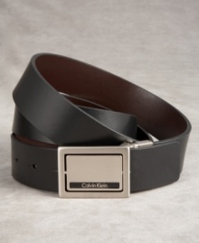 Reversible from brown to black, this smooth leather belt is a true multi-tasker. The silver plaque buckle gives it a distinctly modern edge, and flips to offer a whole different look. Reversible from brown to black, this smooth leather belt is a true multi-tasker. The silver plaque buckle gives it a distinctly modern edge, and flips to offer a whole different look.