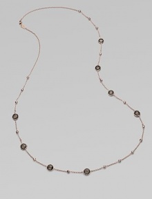 This 18k gold and sterling silver design is plated in 18k rose gold with faceted smokey quartz stations for a simply luxurious look. 18k gold and sterling silver with 18k rose goldplatingSmokey quartzLength, about 37Lobster clasp closureImported This 18k gold and sterling silver design is plated in 18k rose gold with faceted smokey quartz stations for a simply luxurious look. 18k gold and sterling silver with 18k rose goldplatingSmokey quartzLength, about 37Lobster clasp closureImported