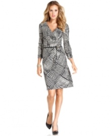 Tahari by ASL reinvigorates a herringbone motif with this exaggerated spin on the pattern, set on a sleek, belted silhouette. Tahari by ASL reinvigorates a herringbone motif with this exaggerated spin on the pattern, set on a sleek, belted silhouette.