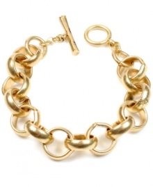 All that glitters in gold. Kenneth Cole New York's simply stylish link bracelet features a chic toggle clasp and round-shaped links in gold tone mixed metal. Approximate length: 7-1/2 inches.