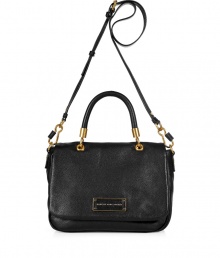 Undeniably chic, this classic convertible bag from Marc by Marc Jacobs exudes ladylike style - Front flap closure with logo plaque, top carrying handle with gold-toned hardware, convertible shoulder strap, textured leather - Perfect for your casual-cool looks or off-duty chic Undeniably chic, this classic convertible bag from Marc by Marc Jacobs exudes ladylike style - Front flap closure with logo plaque, top carrying handle with gold-toned hardware, convertible shoulder strap, textured leather - Perfect for your casual-cool looks or off-duty chic