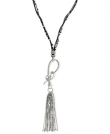 Slip into something new. Jessica Simpson's necklace is crafted from silver-tone mixed metal with a stylish tassel pendant. A snake motif adorns the black chord for a bit of an edge. Approximate length: 28 inches + 6-inch drop. Slip into something new. Jessica Simpson's necklace is crafted from silver-tone mixed metal with a stylish tassel pendant. A snake motif adorns the black chord for a bit of an edge. Approximate length: 28 inches + 6-inch drop.