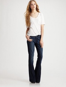 Fashion-forward flares with low-rise waist in subtly sanded stretch denim.THE FITFitted through hips and thighs Medium rise, about 8 Inseam, about 34¼THE DETAILSZip fly Five-pocket style Plain back patch pockets 78% cotton/20% Polyester/2% spandex Machine wash Made in USA of imported fabric