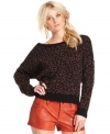 In a stylishly slouchy shape, this Free People leopard sweater is a hot layering piece!